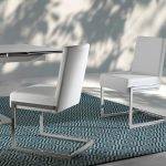Chair upholstered in leatherette with chromed steel frame