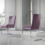 Chair upholstered in leatherette with chromed steel frame