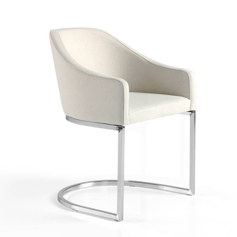 Upholstered Armchair with stainless steel frame. Upholstered Armchair with stainless steel frame.