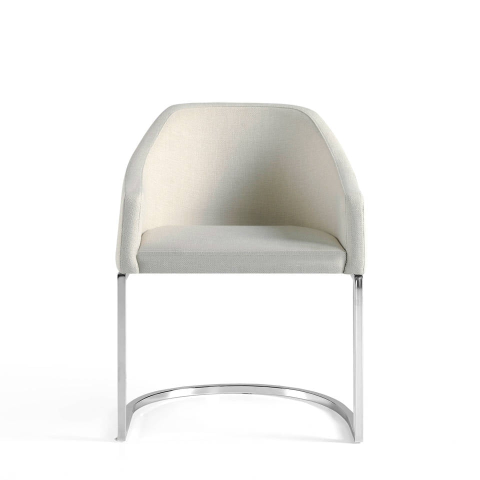 Upholstered Armchair with stainless steel frame. Upholstered Armchair with stainless steel frame.