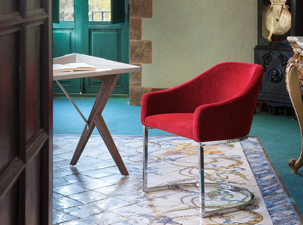 Upholstered Armchair with stainless steel frame. Upholstered Armchair with stainless steel frame.