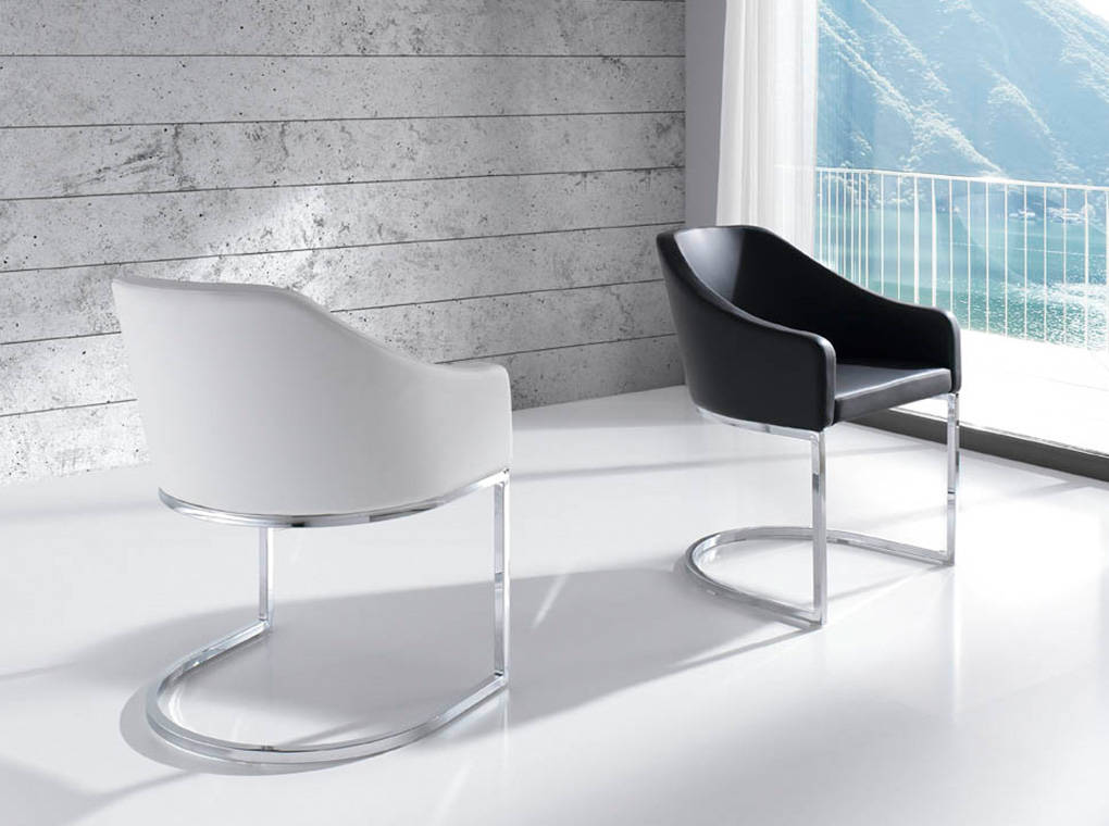 Upholstered Armchair with stainless steel frame. Upholstered Armchair with stainless steel frame.