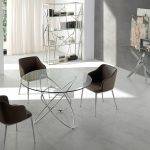 Chair upholstered in leatherette with chromed steel frame