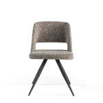 Chair upholstered in fabric with black steel legs