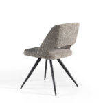 Chair upholstered in fabric with black steel legs