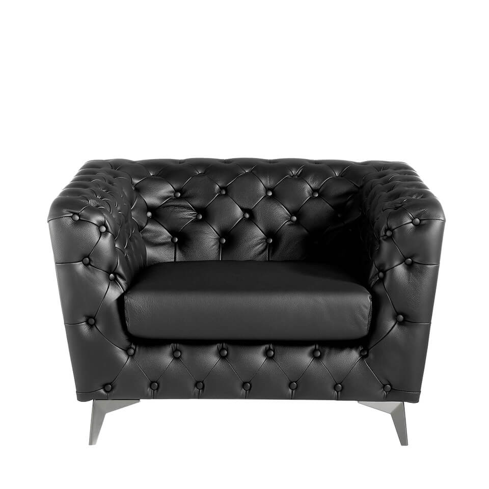 Armchair upholstered in leather with capitone effect Armchair upholstered in leather with capitone effect