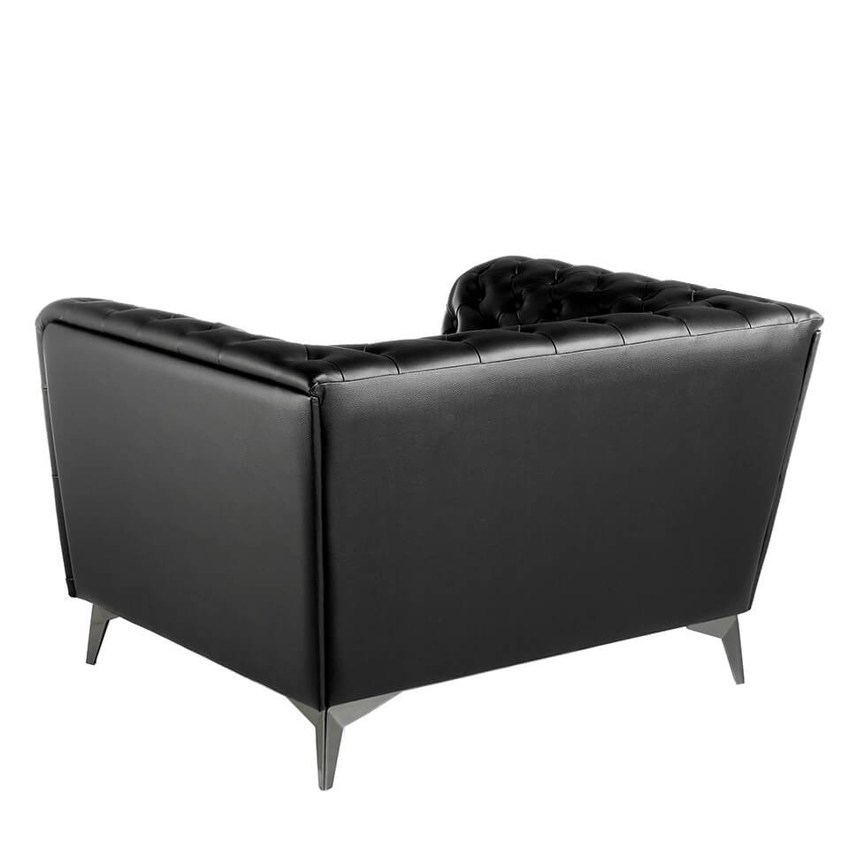 Armchair upholstered in leather with capitone effect Armchair upholstered in leather with capitone effect