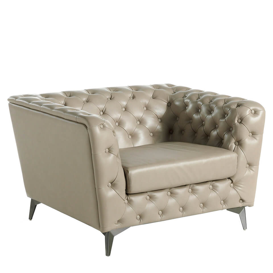 Armchair upholstered in leather witn capitone effect Armchair upholstered in leather witn capitone effect