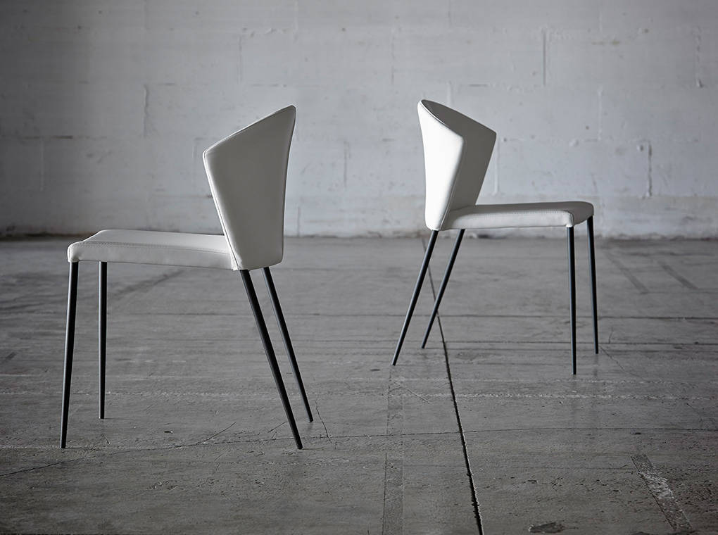 Upholstered chair with black steel frame. Upholstered chair with black steel frame.