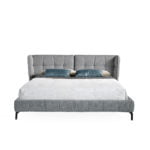 Bed upholstered in fabric with Walnut wood frame