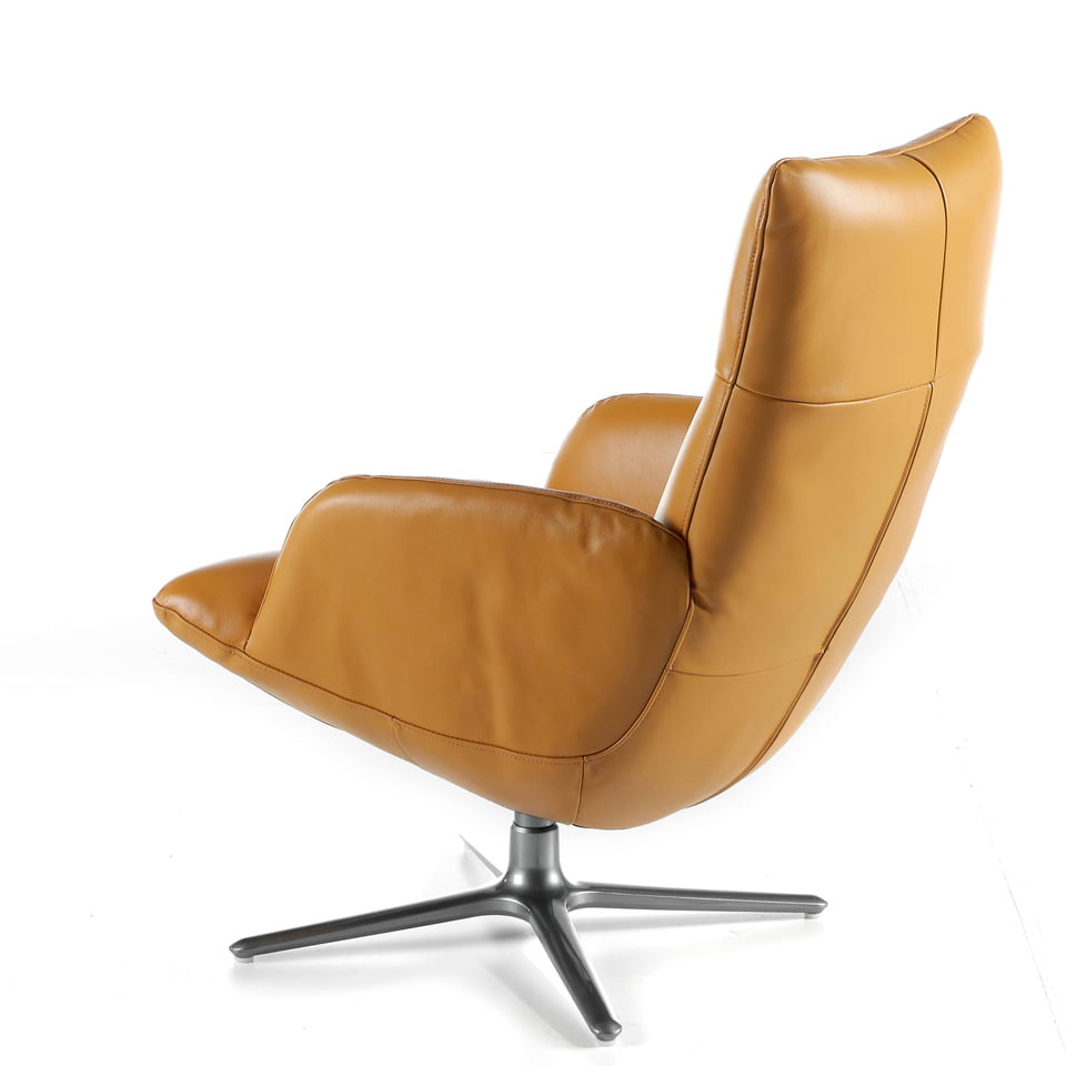 Swivel armchair upholstered in 2mm thick leather with stainless steel base Swivel armchair upholstered in 2mm thick leather with stainless steel base