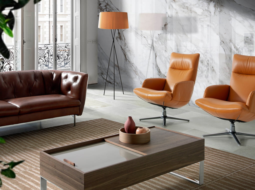 Swivel armchair upholstered in 2mm thick leather with stainless steel base Swivel armchair upholstered in 2mm thick leather with stainless steel base