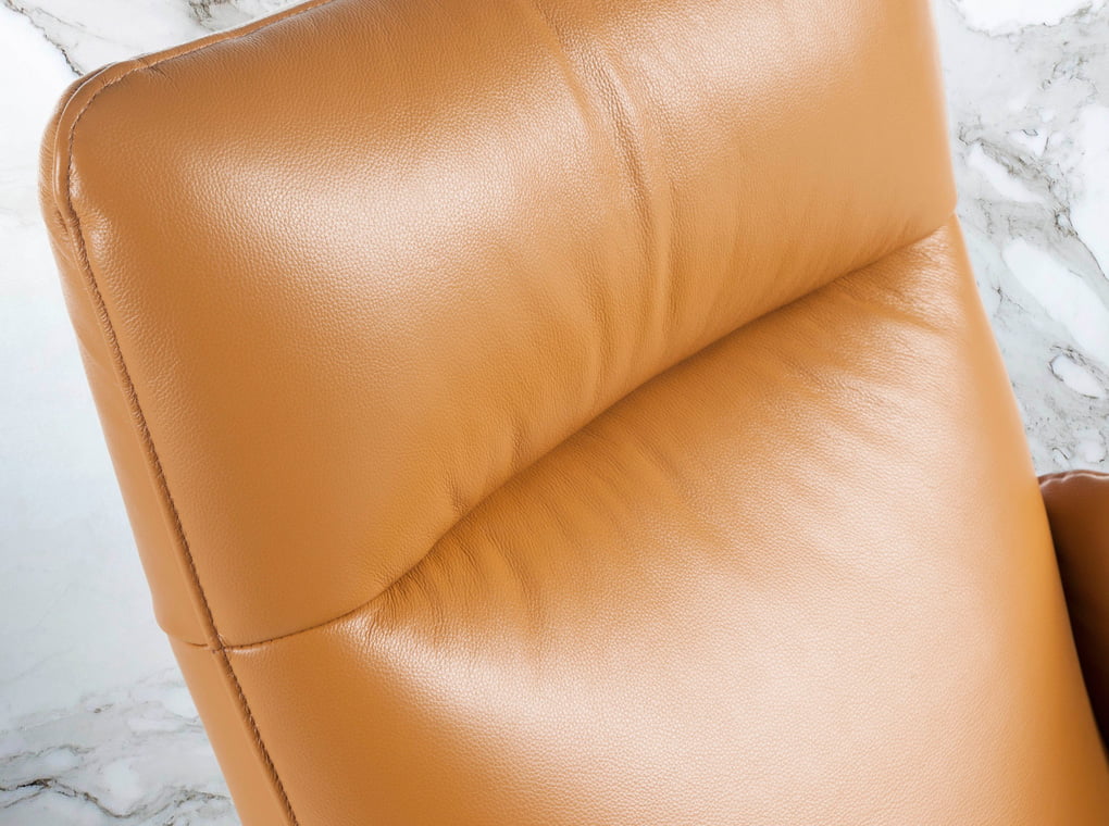 Swivel armchair upholstered in 2mm thick leather with stainless steel base Swivel armchair upholstered in 2mm thick leather with stainless steel base