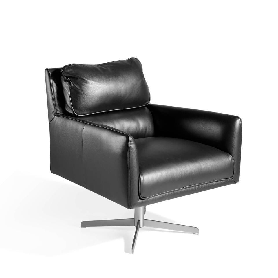 Swivel armchair upholstered in cowhide leather Swivel armchair upholstered in cowhide leather