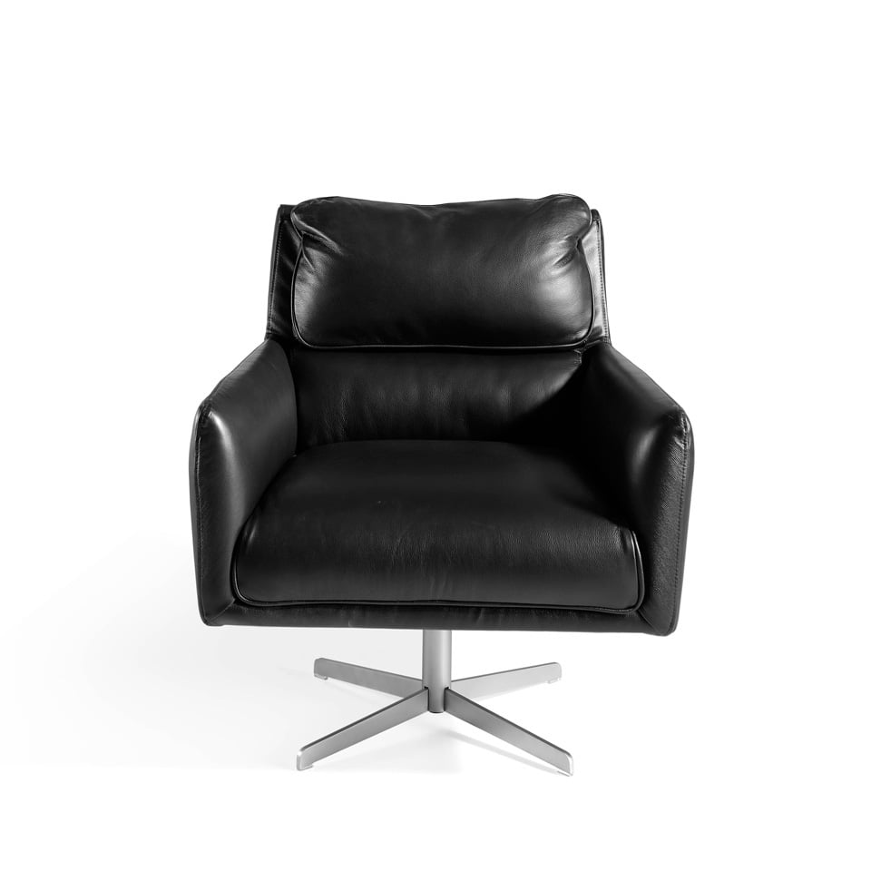 Swivel armchair upholstered in cowhide leather Swivel armchair upholstered in cowhide leather