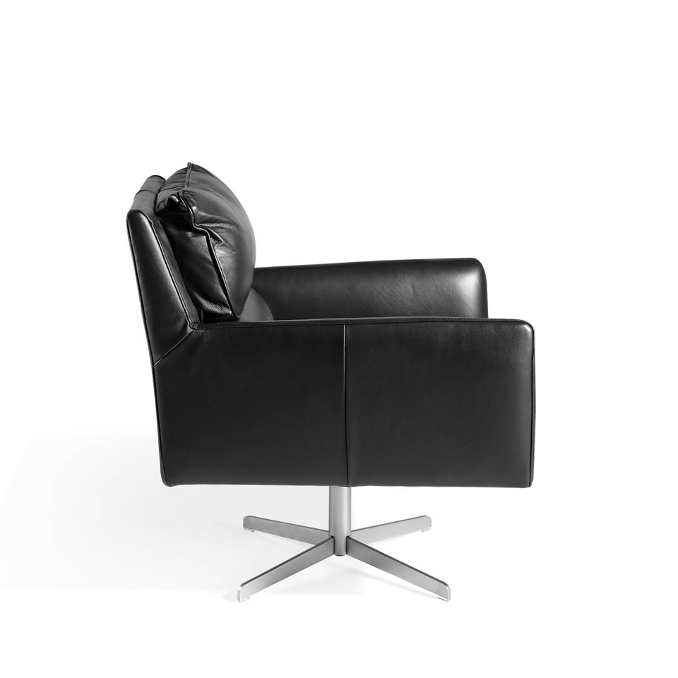 Swivel armchair upholstered in cowhide leather Swivel armchair upholstered in cowhide leather