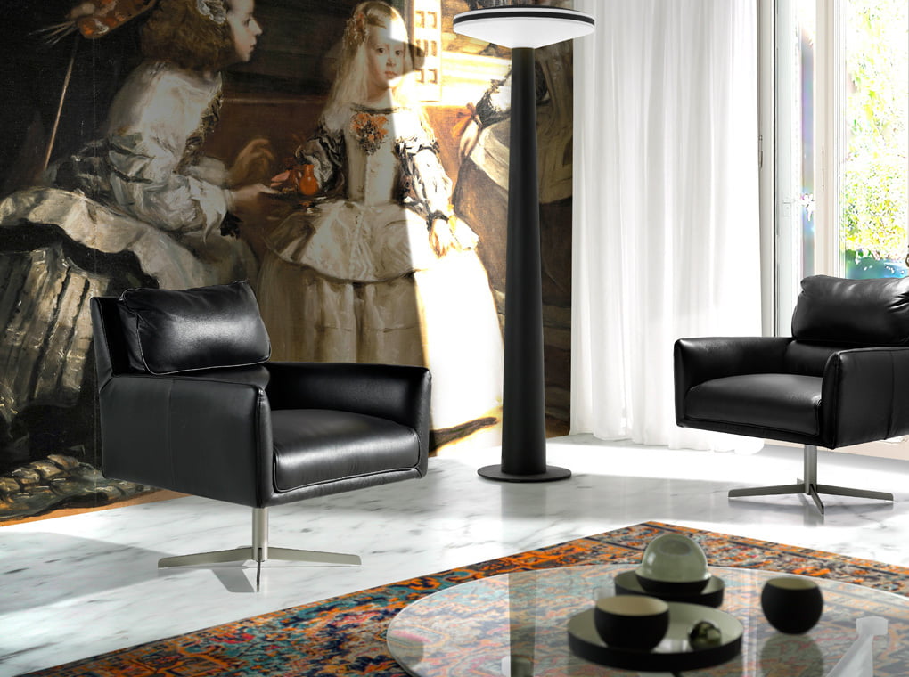 Swivel armchair upholstered in cowhide leather Swivel armchair upholstered in cowhide leather