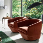 Swivel armchair upholstered in velvet