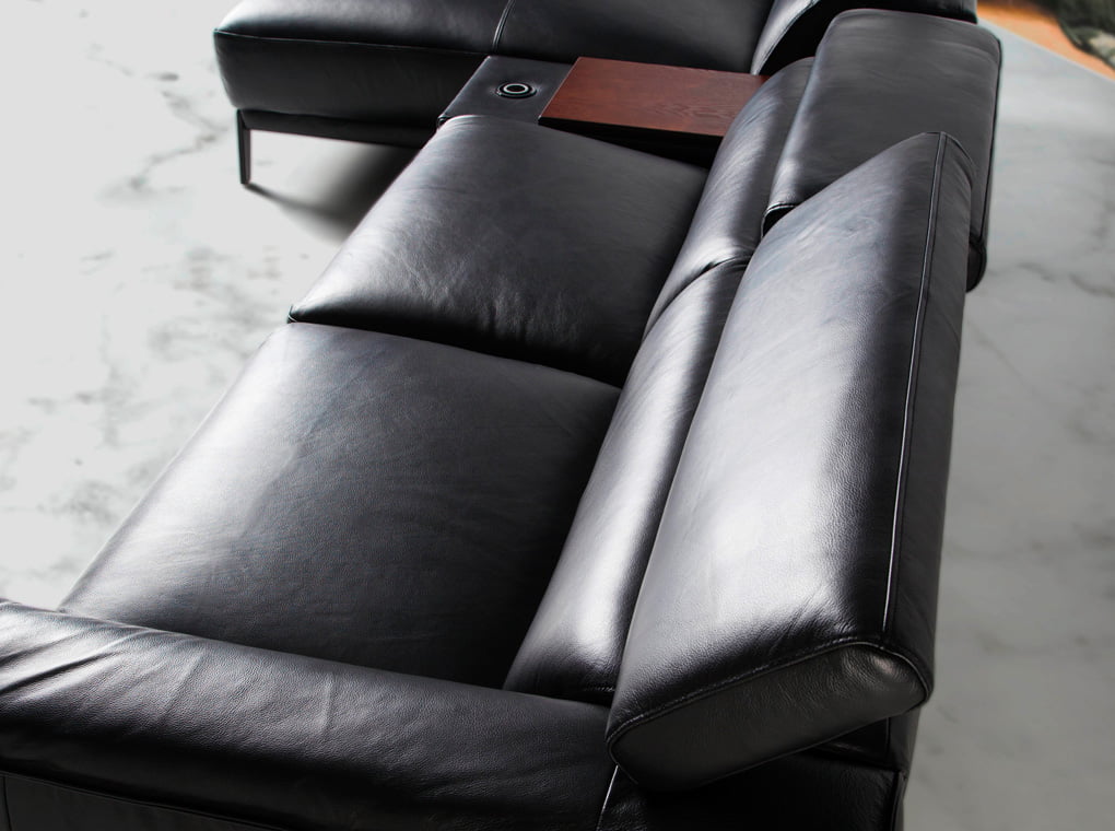 Chaise longue sofa upholstered in leather Chaise longue sofa upholstered in leather