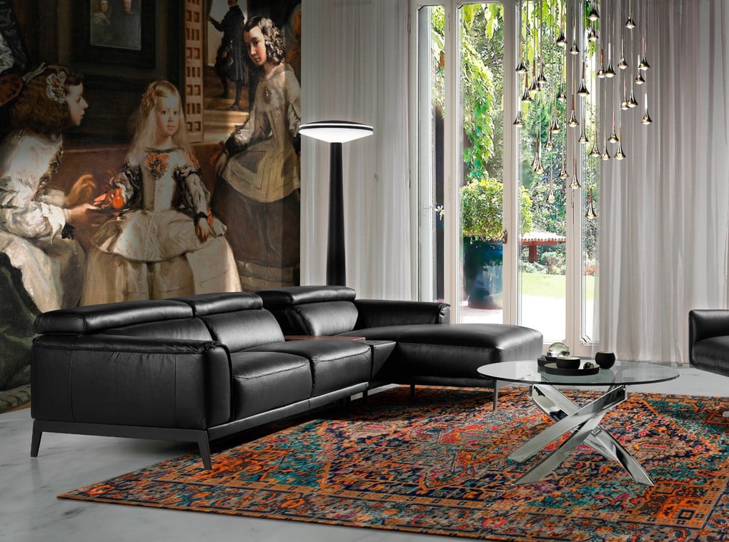 Chaise lounge sofa upholstered in leather with stainless steel legs Chaise lounge sofa upholstered in leather with stainless steel legs