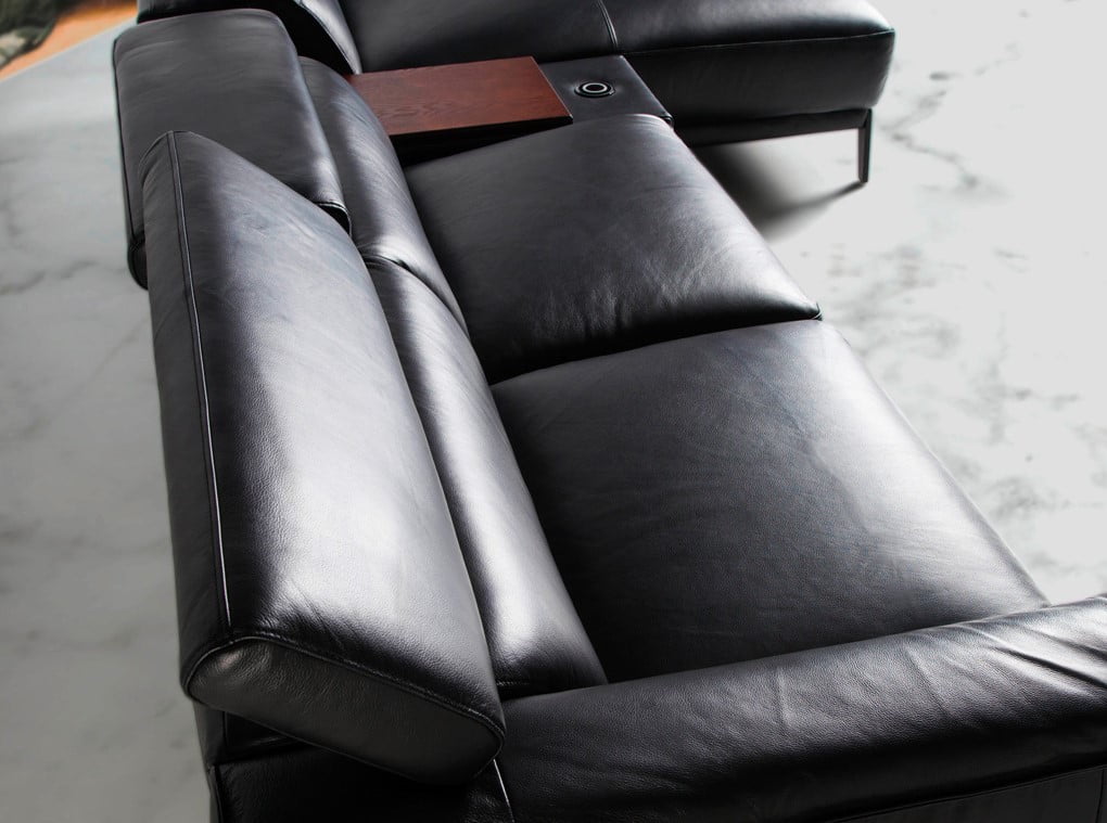 Chaise lounge sofa upholstered in leather with stainless steel legs Chaise lounge sofa upholstered in leather with stainless steel legs