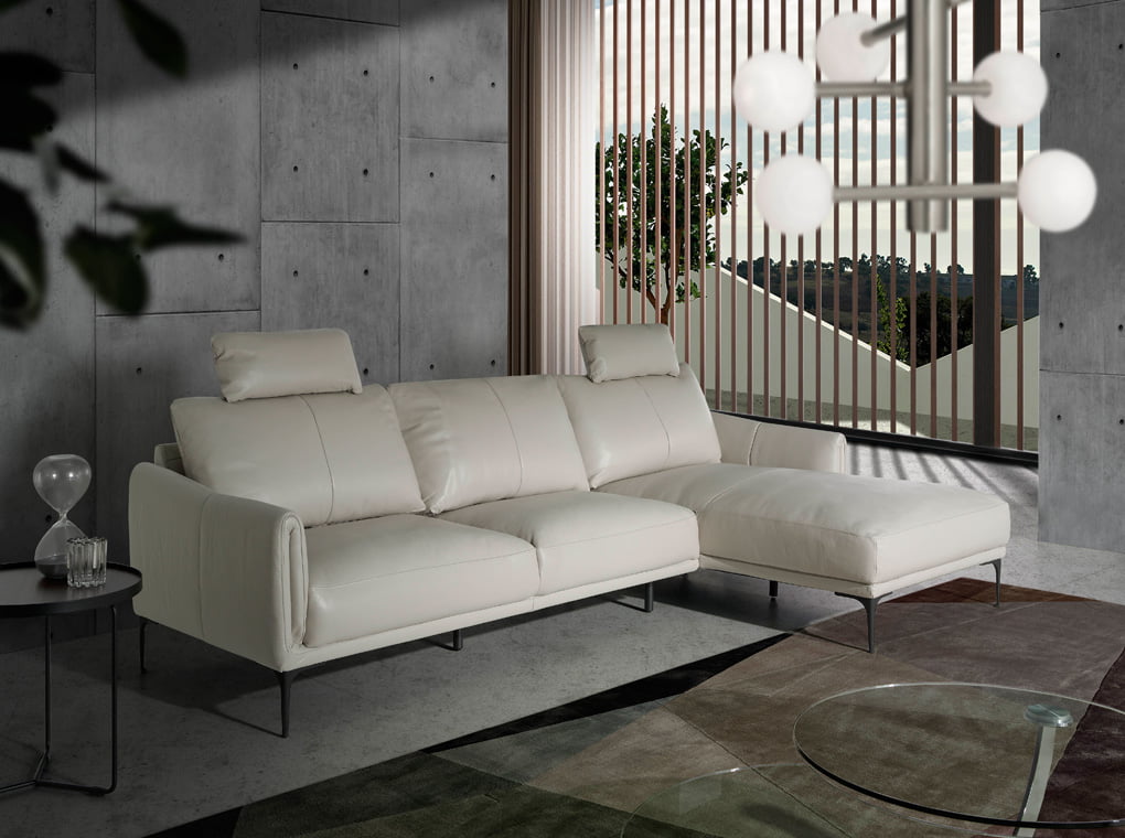 Chaise longue sofa upholstered in leather Chaise longue sofa upholstered in leather