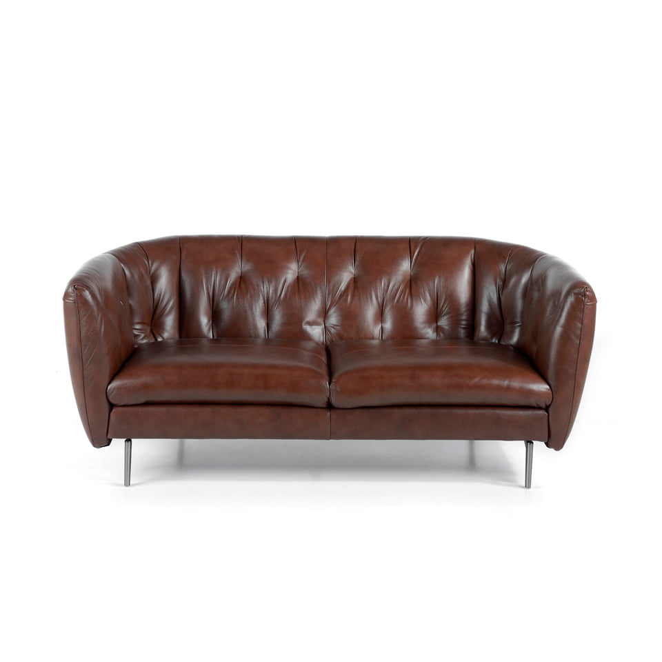 2-seater sofa upholstered in tufted leather 2-seater sofa upholstered in tufted leather