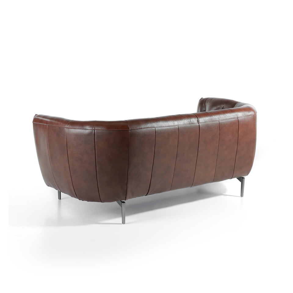 2-seater sofa upholstered in tufted leather 2-seater sofa upholstered in tufted leather