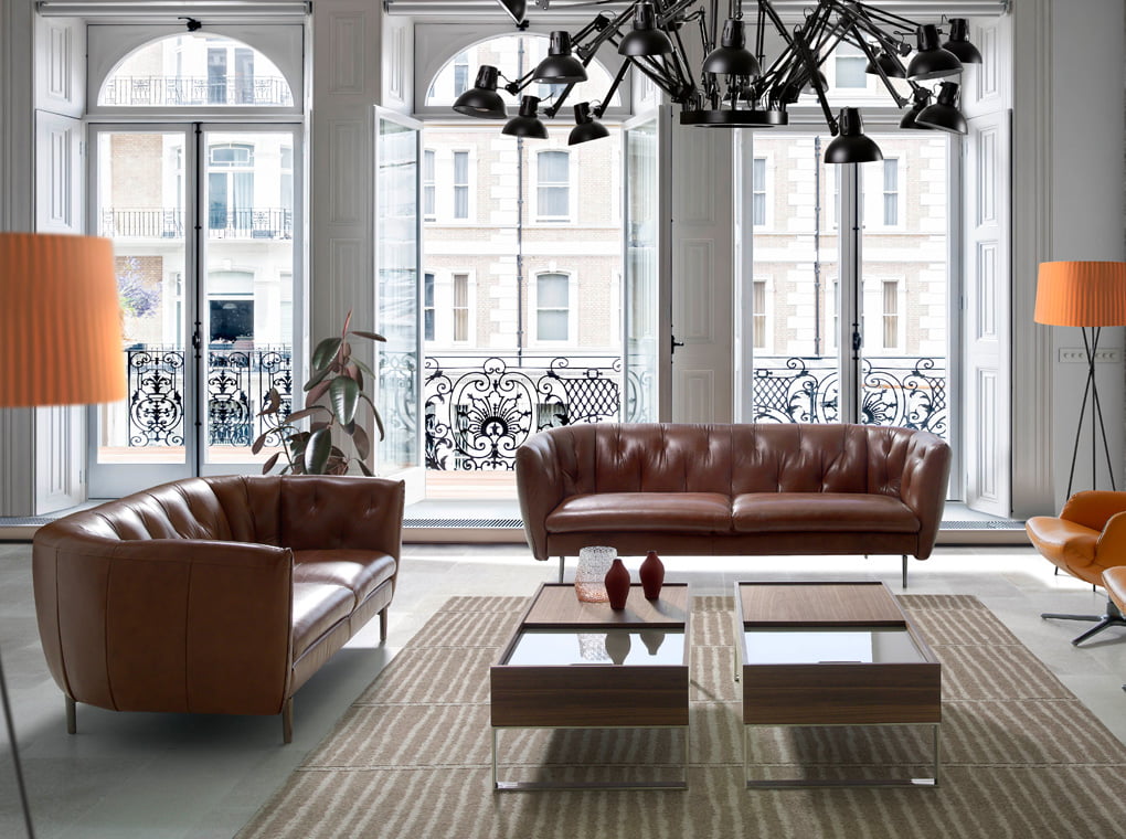 2-seater sofa upholstered in tufted leather 2-seater sofa upholstered in tufted leather