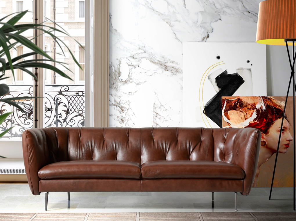 3-seater sofa upholstered in tufted leather 3-seater sofa upholstered in tufted leather