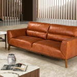 3-seater sofa upholstered in leather with Walnut wood legs