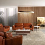 3-seater sofa upholstered in leather with Walnut wood legs