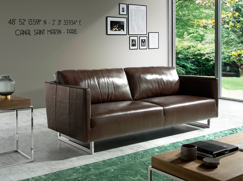 2 seater sofa upholstered in leather with chrome steel legs 2 seater sofa upholstered in leather with chrome steel legs