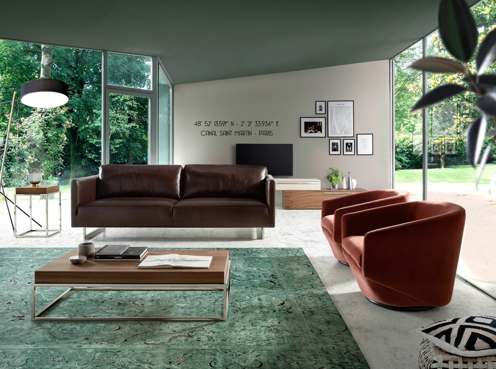 2 seater sofa upholstered in leather with chrome steel legs 2 seater sofa upholstered in leather with chrome steel legs