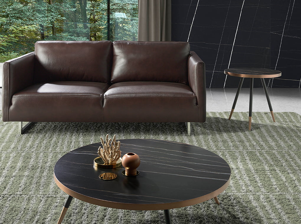 2 seater sofa upholstered in leather with chrome steel legs 2 seater sofa upholstered in leather with chrome steel legs