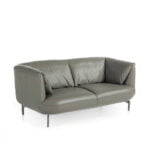 2-seater sofa upholstered in leather with polished steel legs