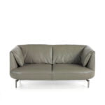 2-seater sofa upholstered in leather with polished steel legs