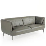 3-seater sofa upholstered in leather with polished steel legs