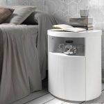 White round wooden bedside table