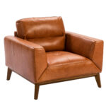Sillón tapizado en piel y patas madera Nogal