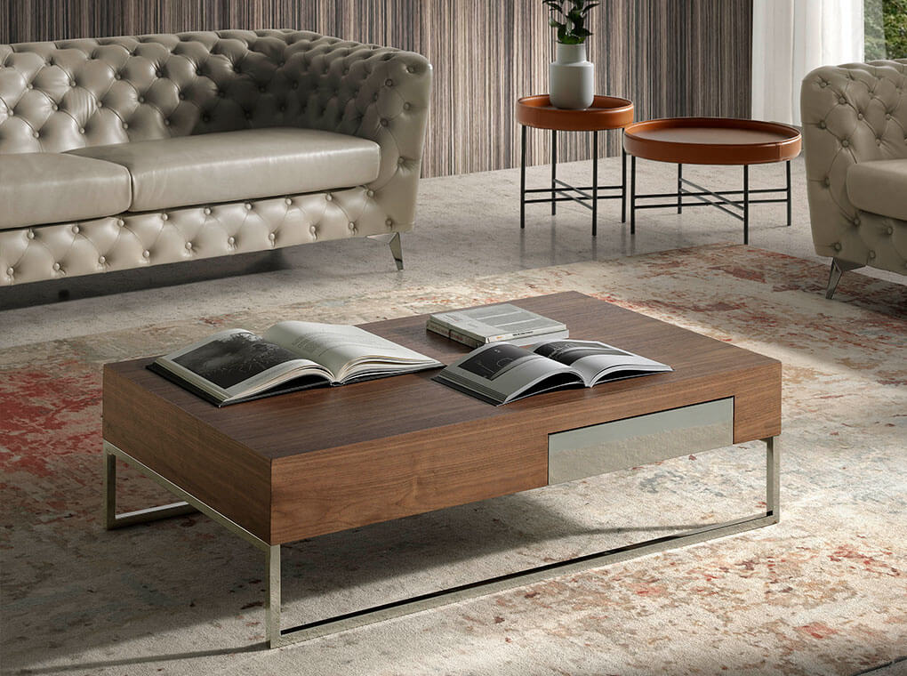 Coffee table in walnut veneer with one side drawer and chrome plated steel legs Coffee table in walnut veneer with one side drawer and chrome plated steel legs
