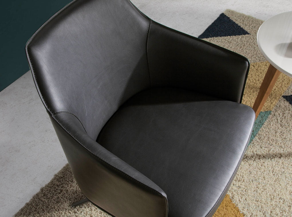 Swivel armchair upholstered in leatherette Swivel armchair upholstered in leatherette