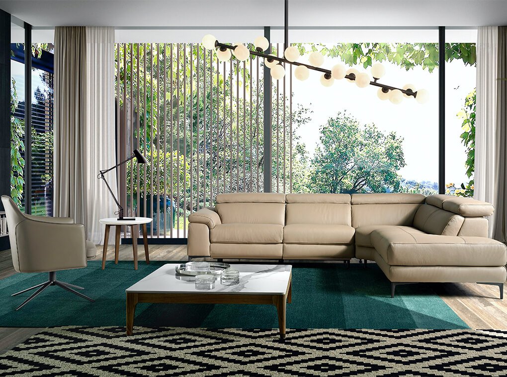 Corner sofa upholstered in leather and stainless steel legs Corner sofa upholstered in leather and stainless steel legs
