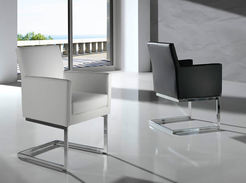 Upholstered Armchair with stainless steel frame. Upholstered Armchair with stainless steel frame.