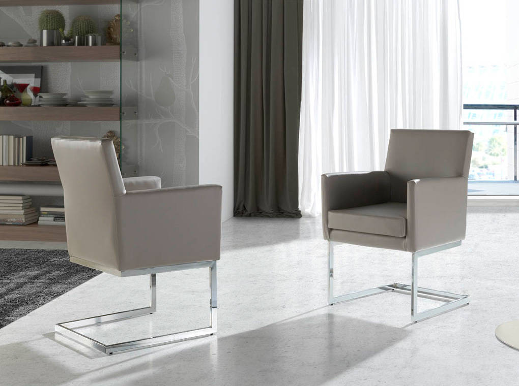 Upholstered Armchair with stainless steel frame. Upholstered Armchair with stainless steel frame.