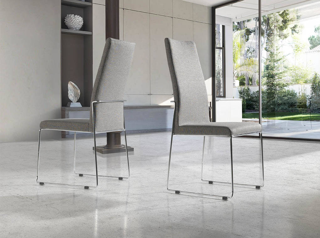 Upholstered chair with stainless steel frame. Upholstered chair with stainless steel frame.