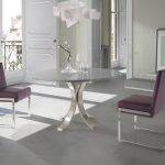 Chair upholstered in leatherette with chromed steel frame