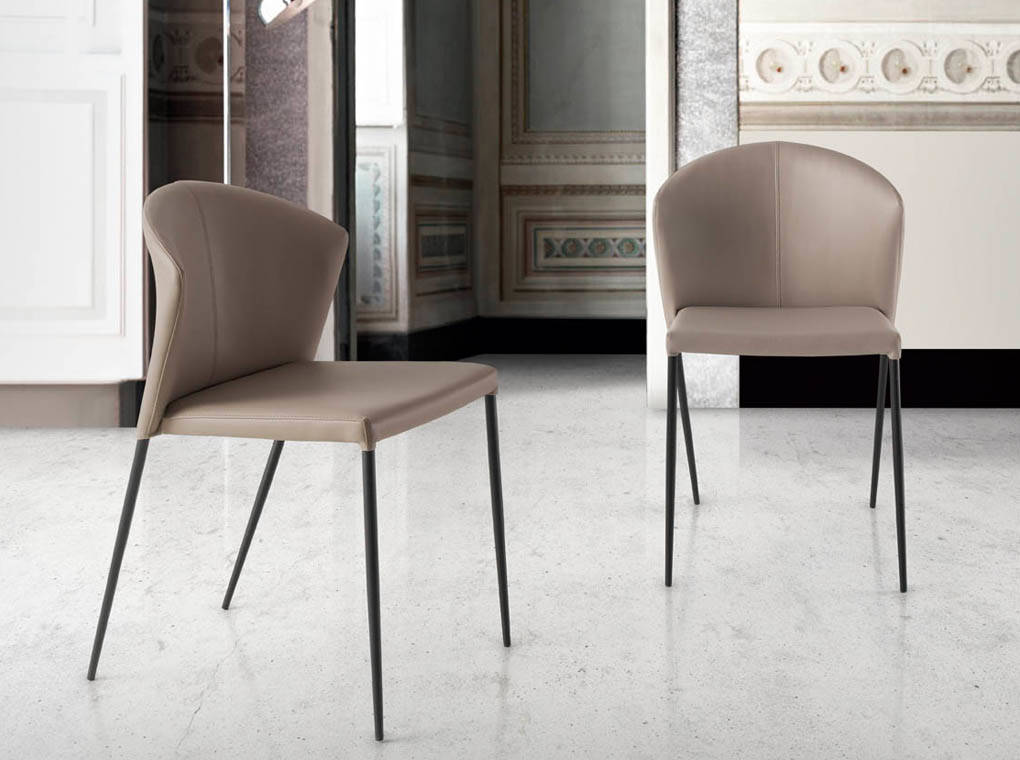 Upholstered chair with black steel frame. Upholstered chair with black steel frame.