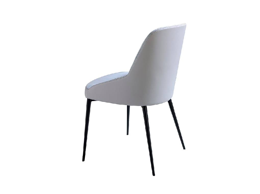 Dining chair upholstered in velvet and eco-leather. Black steel structure.