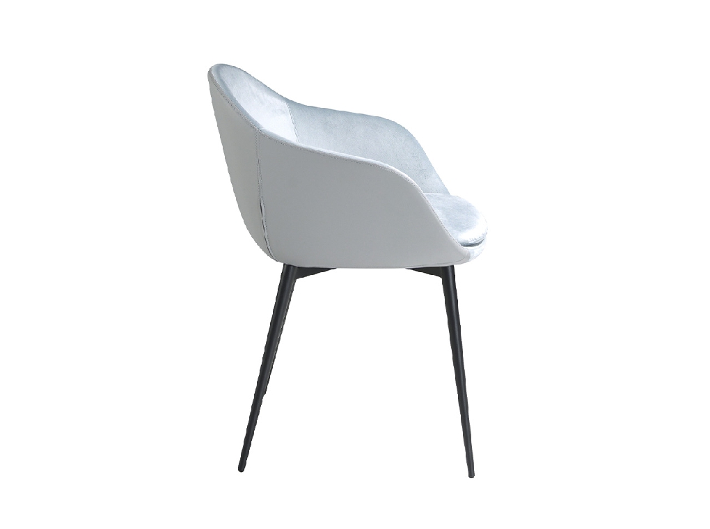 Silla comedor tapizada en terciopelo y polipiel. Estructura en acero negro.